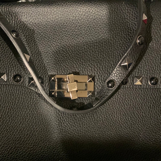 Leather and studd shoulder bag