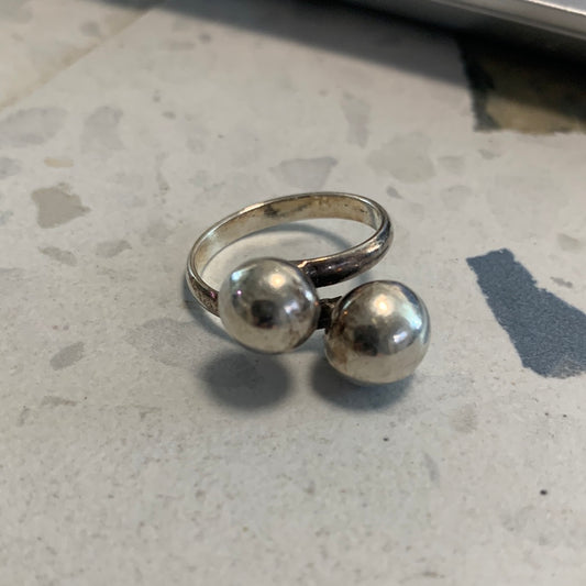 Silver ring with two balls