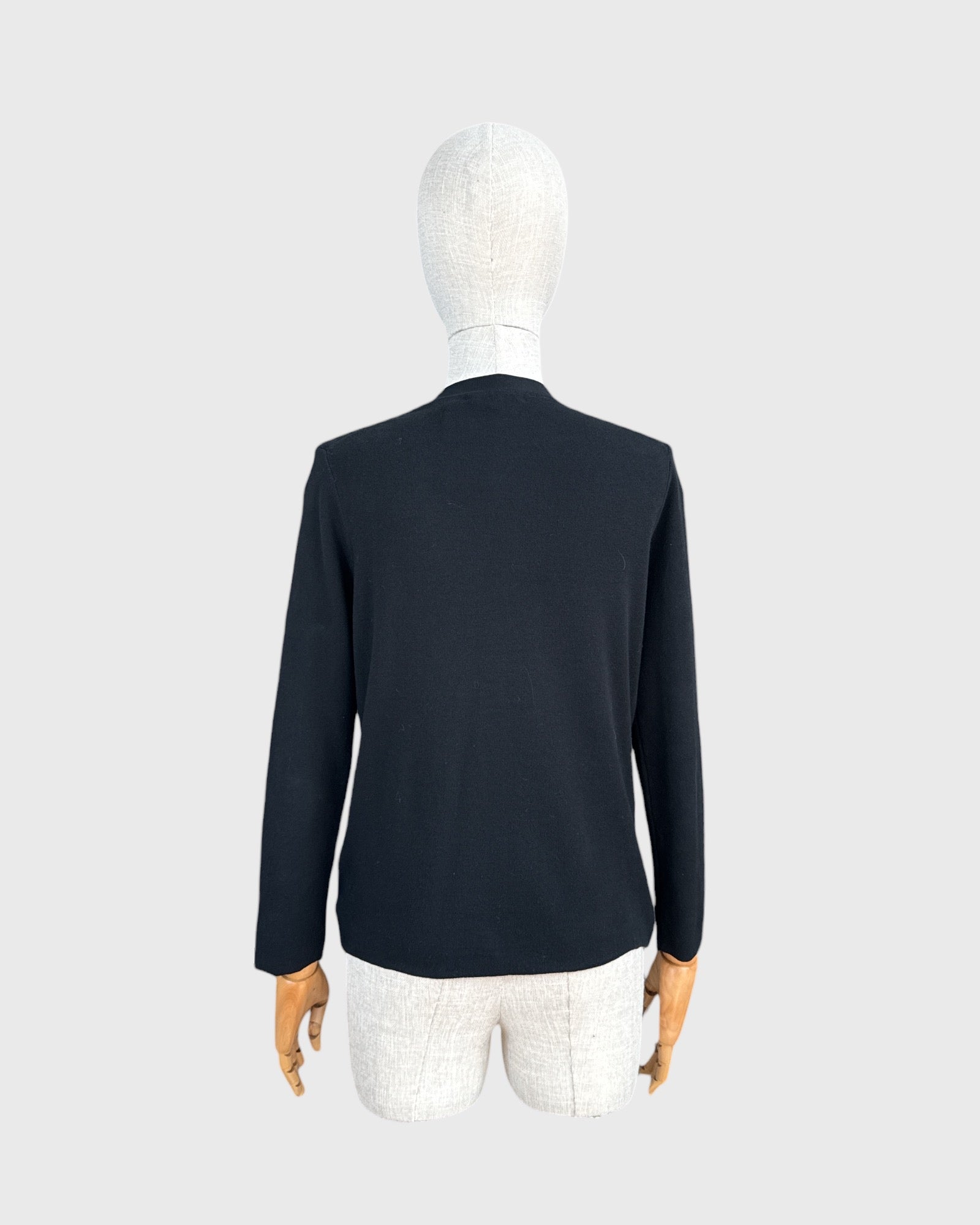 Cardigan. That goes without saying, M